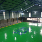 Lantai interlock futsal hijau di lapangan indoor
